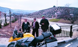 Three country gentlemen come by to groove on our GS. Spaniards love motociclettas.