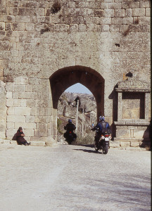 The gate into the town of Sortelha shows the thickness of medieval walls. Below: Porto had