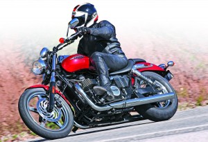 Smaller headlight, 19-inch front wheel and single disc brake are new for 2012. Cornering clearance is typical for a cruiser.