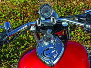 Wide handlebar is on a nearly five-inch riser. Tank-top nacelle holds the tach and indicator lights.