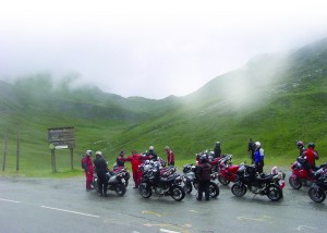 The Posse takes a break, and a natural shower, along the Italian/French border. Clouds descend upon the passes with amazing quickness, going from clear and bright to moody and damp, or just purely wet, in a matter of a few minutes.