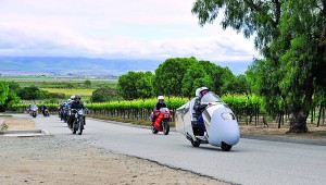 The Friday Quail-Ride crowd is arriving at the Talbott Vineyards, with Alan Smith leading the way on his Vetterized Kawasaki 250 Ninja—which averaged 103 mpg.