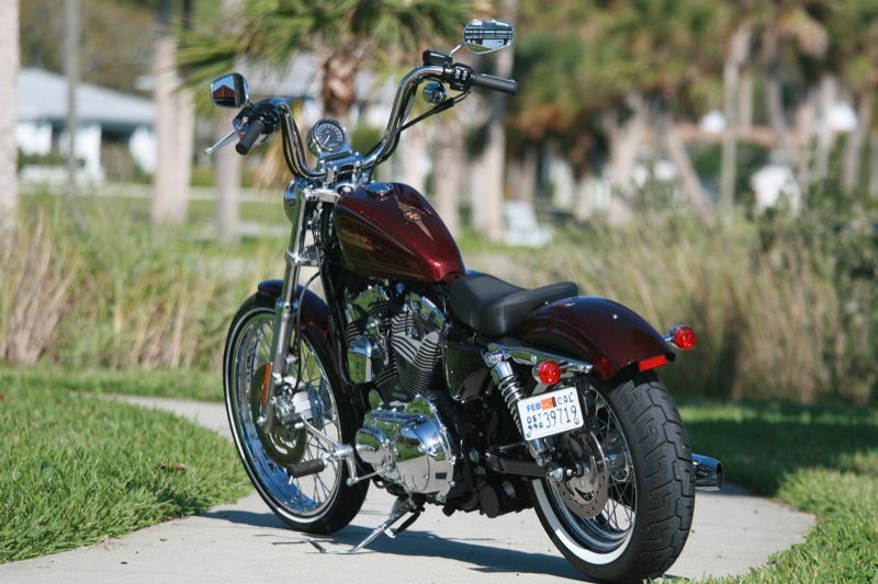 A sea of chrome and Hard Candy Big Red Flake paint treatment dazzle the eye