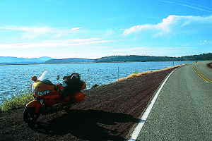 Klamath Lake by morning light. Mind the gravel—guard rails are for wimps.