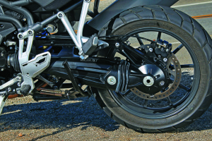 Geometry of the single-sided swingarm eliminates jacking from the metalastic drive shaft, which also has a torsional damper.