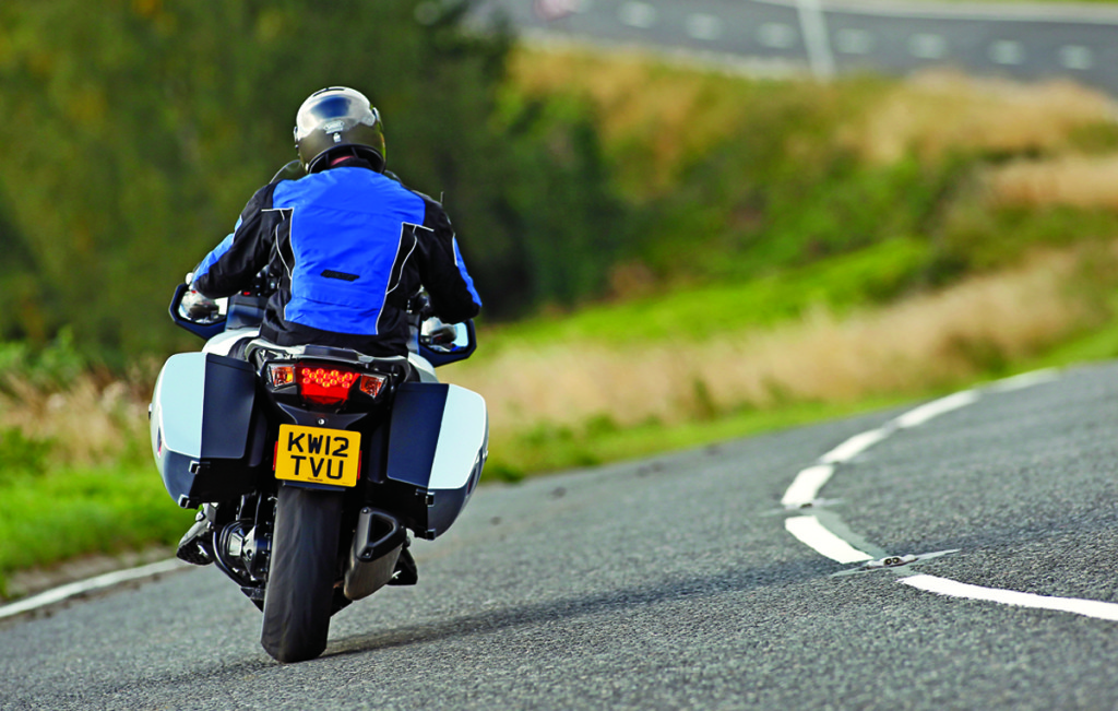 Triumph’s Dynamic Luggage System allows the saddlebags to swing side-to-side five degrees, which is said to improve stability. at high speed.