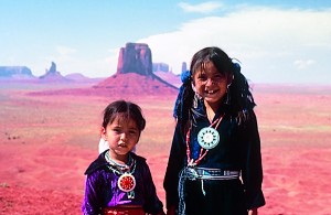 Navajo girls in native dress in Monument Valley Tribal Park.