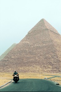 The base of 450-foot Cheops pyramid covers the equivalent of seven city blocks. Its 2,500,000 blocks of limestone and granite weigh two to 60 tons each.