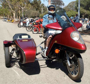 Vintage Streamliner: Jerry Young matched his Honda Goldwing to a classic late 1970’s Jacwal SuperWedge fairing, coloring matching it to Watsonian sidecar. Note “shock absorbers” balancing out the combination.