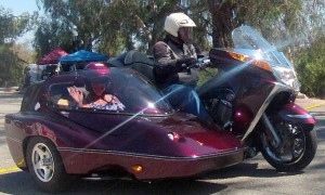 Super Swoopy Victory: Ray Anderson and wife Nancie travel thousands of miles in a 2008 Victory Vision Tour powered sidecar combination. Ray has owned over 60 motorcycles including an entire collection of the Honda Gyro scooters. When asked why he picked the new Victory cruiser from all other bikes, he said, “Comfort," then laughed and added, “At my age it all has to do with how long I can sit on a motorcycle. This is my first Victory and the hardest thing to do on this bike is stay awake since it’s so smooth."