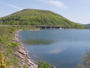 Route 10 is nearly empty of traffic and passes through the green Catskill Mountains and along the shores of blue water reservoirs.
