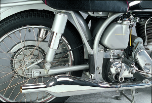 The rear half of the Featherbed frame, with Woodhouse Monroe shocks and a muffler from the twin of the same era.