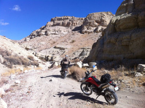 The Mojave Desert is a strange and beautiful place. Paul rides into a small canyon just before we reached the Husky Memorial.