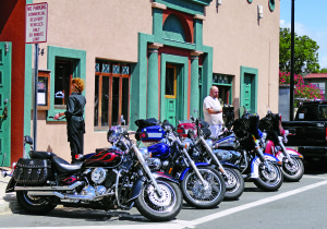 Parking can be difficult in the old town section of St. Augustine. These motorcyclists make an efficient use of parking space.