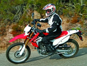 Ride red to enjoy the CRF250L’s slick motor and comfortable ride. Good in the dirt, great on the street, the Honda’s price belies its abilities.