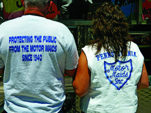 A husband and wife pair showed off their T-shirts.