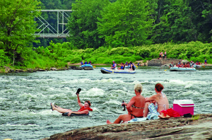 Challenging the wild, free-flowing Delaware River at Skinner’s Falls.
