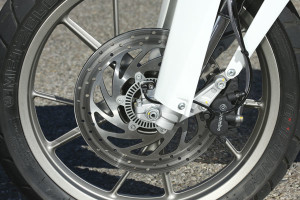 The two-disc brake setup is by Brembo; power is decent, ABS is standard.