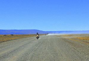 Another group of riders streams by on wide-open Ruta 40.