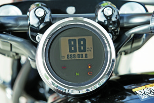 The single LCD gauge is also round and has a smoked lens.