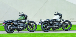 The R-Spec model (left) has reservoir shocks, a stitched seat, black mirrors and alternative colors.
