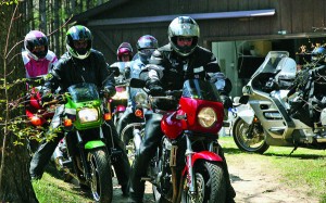 Riders line up to head out on a group ride after a picnic hosted by one of the members.
