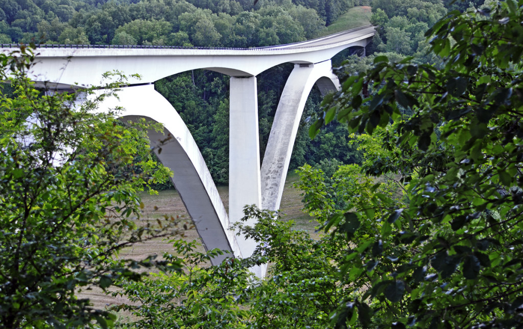 The double-arch bridge was assembled using precast concrete boxes, fabricated off site and hoisted into place.