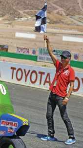 Corsa event originator Yoshi Kosaka signals the race to begin.