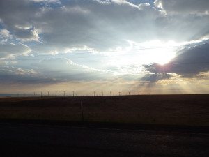 Rays of sunshine and windmills on the Journey Through Time Scenic Byway (U.S. 97).