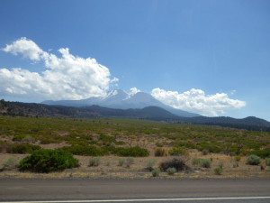 Mt. Shasta finally emerges from behind the clouds. This stretch of U.S. 97 is part of the Volcanic Legacy Scenic Byway.
