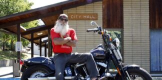 Bucky the biker Mayor doesn't hang out at City Hall, choosing to hold court at Lucky's, his favorite bar instead