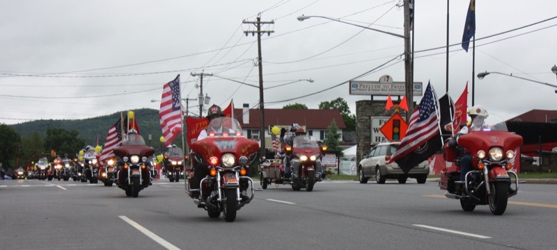 Members of the Fire Riders MC lead the Dunlop Bike Parade on Saturday