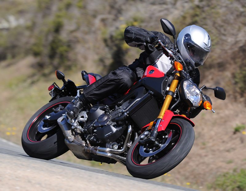 The 2014 Yamaha FZ-09 is a light, torquey triple that costs less than $8,000.