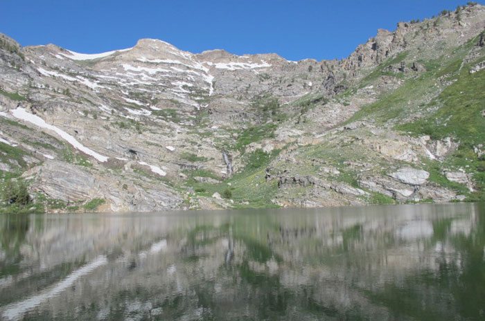A glacial cirque is mirrored in Angel Lake at 8,500 feet in the Humboldt Range above Wells.