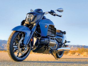 Lacking a fairing like the GL1800 and F6B, sculpted shrouds cover the side-mounted radiators on the 2014 Honda Gold Wing Valkyrie.