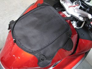 The Kappa TKW746 DryPak Tankbag has a magnetic base. Straps are included should you have a plastic gas tank.