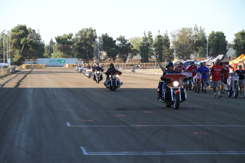 The Warrior Guard rides onto the race track to honor Officer Tonn