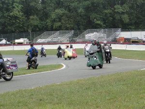 Challengers round the curve at Mid-Ohio Sports Car Course, where the event was held.