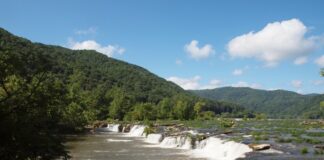 Stop and enjoy the Sandstone Falls State Park on the new River