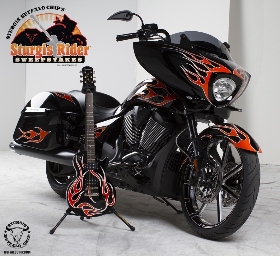 The Ness-customized Victory Cross Country 8-Ball and matching Epiphone guitar for Buffalo Chip's 2014 Sturgis Rider Sweepstakes