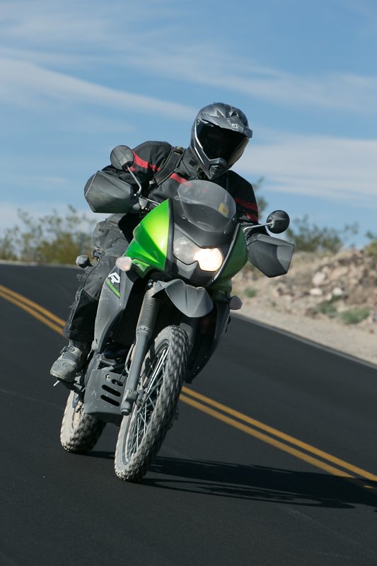 The KLR650's wider, flatter, more supportive seat is good for long hours in the saddle.