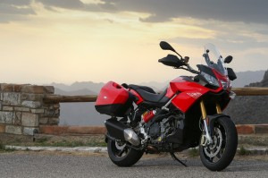 The Aprilia Caponord 1200 ABS Travel Pack is available in Formula Red (shown) or Glam White.