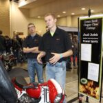 Matt from Mitchell Tech discusses the custom CB750 with interested attendees
