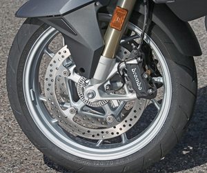 Front EVO  dual-disc brakes on the RT are integrated with the rear disc and use radial-mounted, opposed 4-piston Brembo calipers. 