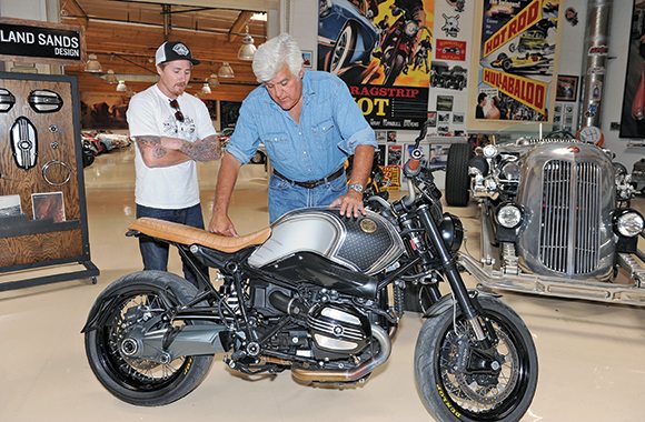 Jay Leno checks out Roland Sands’ customized nineT at the Big Dog Garage. Sands (left) was involved with the nineT from the start as well as its conceptual predecessor, the Concept 90.