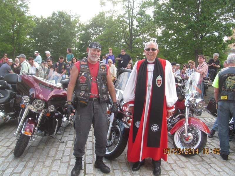 The author with Bishop Jay Magness of the Episcopal Office of Armed Services and Federal Ministries during the bike blessing
