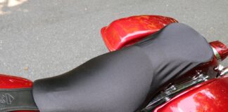 However, if I want to ride the bike with the cover on, I affix it using the hook-and-loop straps, which offer a snugger fit.