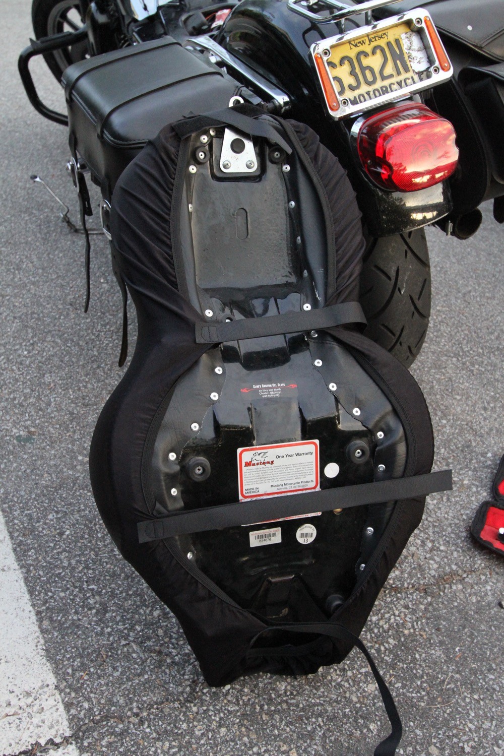 On the SplitWeight “B” model, there are four hook-and-loop straps that are affixed under the seat. You can cut off the excess strap length.