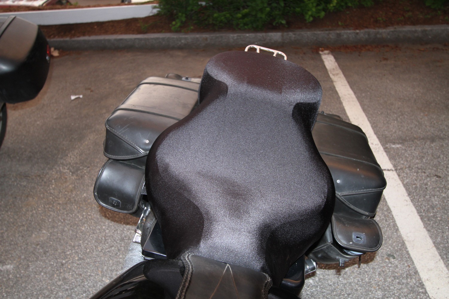 The SplitWeight “B” cover needed to be stretched over the Mustang seat on my FXD, and using the hook-and-loop straps was a necessity even when the bike was parked