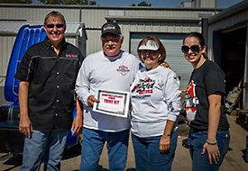 Grand Prize Trike Kit Drawing Winner, Gerald Malik. (Pictured L-R: Motor Trike Owner and President Jeff Vey, Gerald and Mrs. Malik, and Marketing Director Katie Vey).